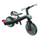 Триколка Globber EXPLORER TRIKE 4 IN 1, ментово зелен цвят – режим баланс колело, преден диагонален изглед.